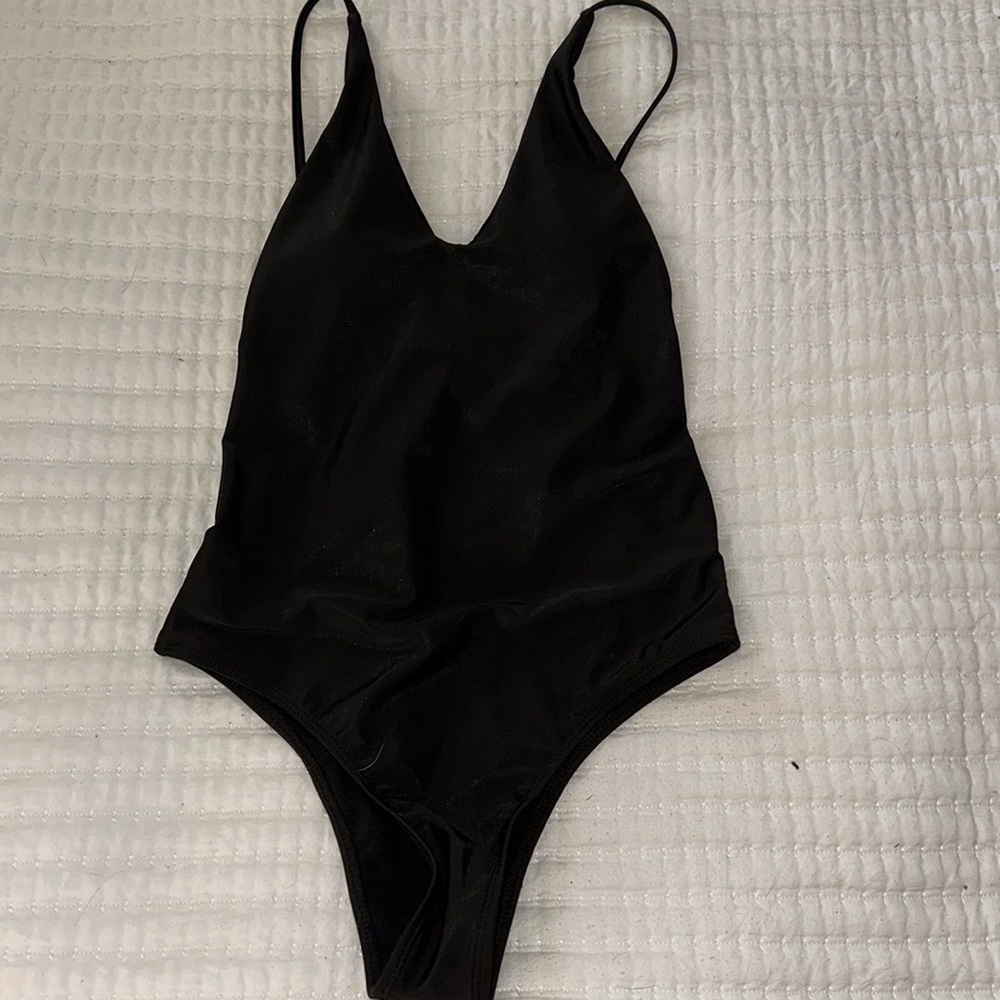 Breezy Swim Size Small black one piece low cut back NWT